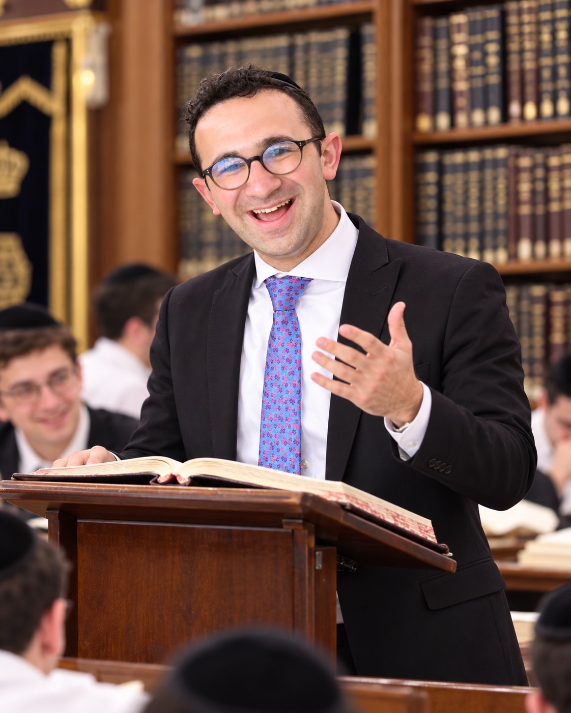 Illustration of Alan speaking from a lectern with an open sefer